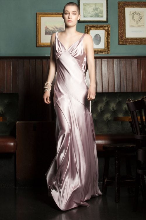 Gown cut in lustrous blush-pink satin cut in bias to skim over the body by Petriiski