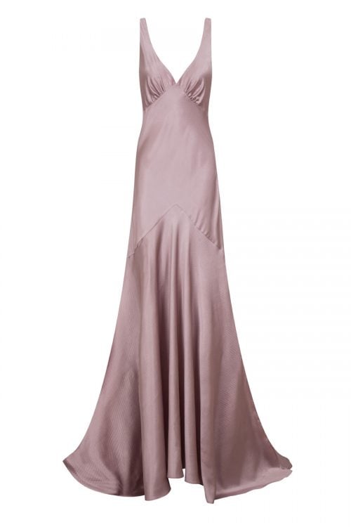 Satin evening dress in blush pink with oval plunging neckline ,low open cow back and leg-baring side slip design by Petriiski